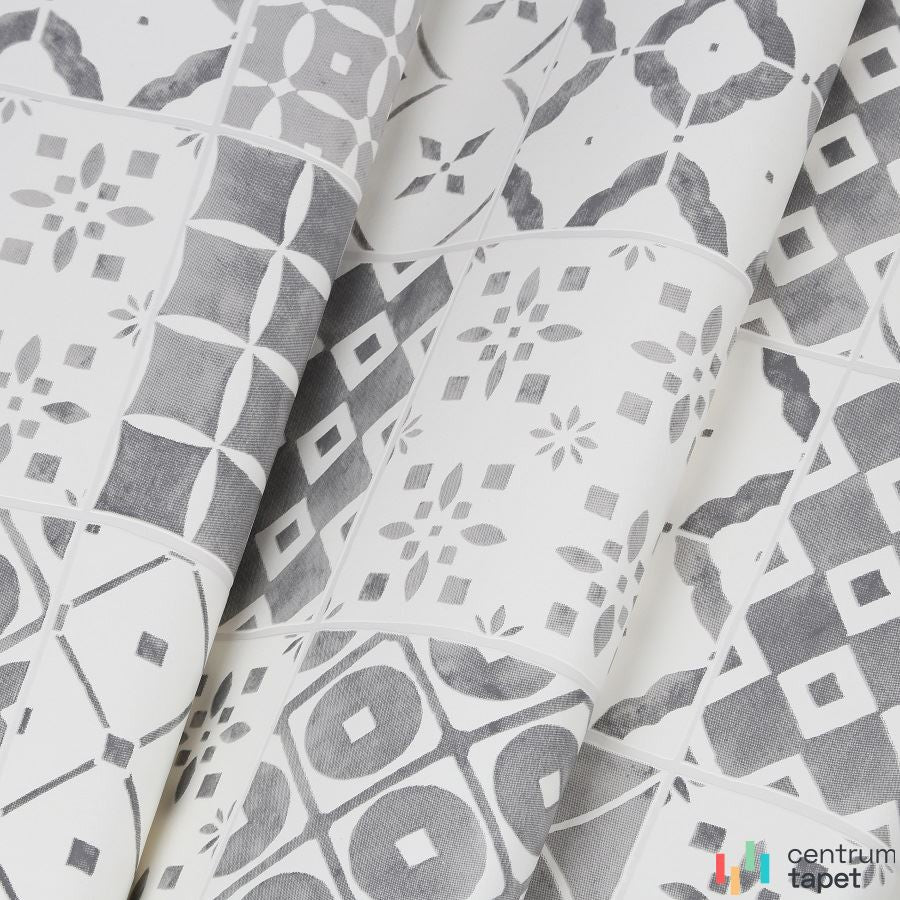 Pofałdowany pas tapety Contour 103853 z kaflami w szare ornamenty i jasnymi fugami